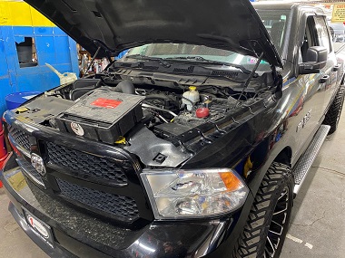 Black Ram Truck receiving a new engine in Philadelphia, PA